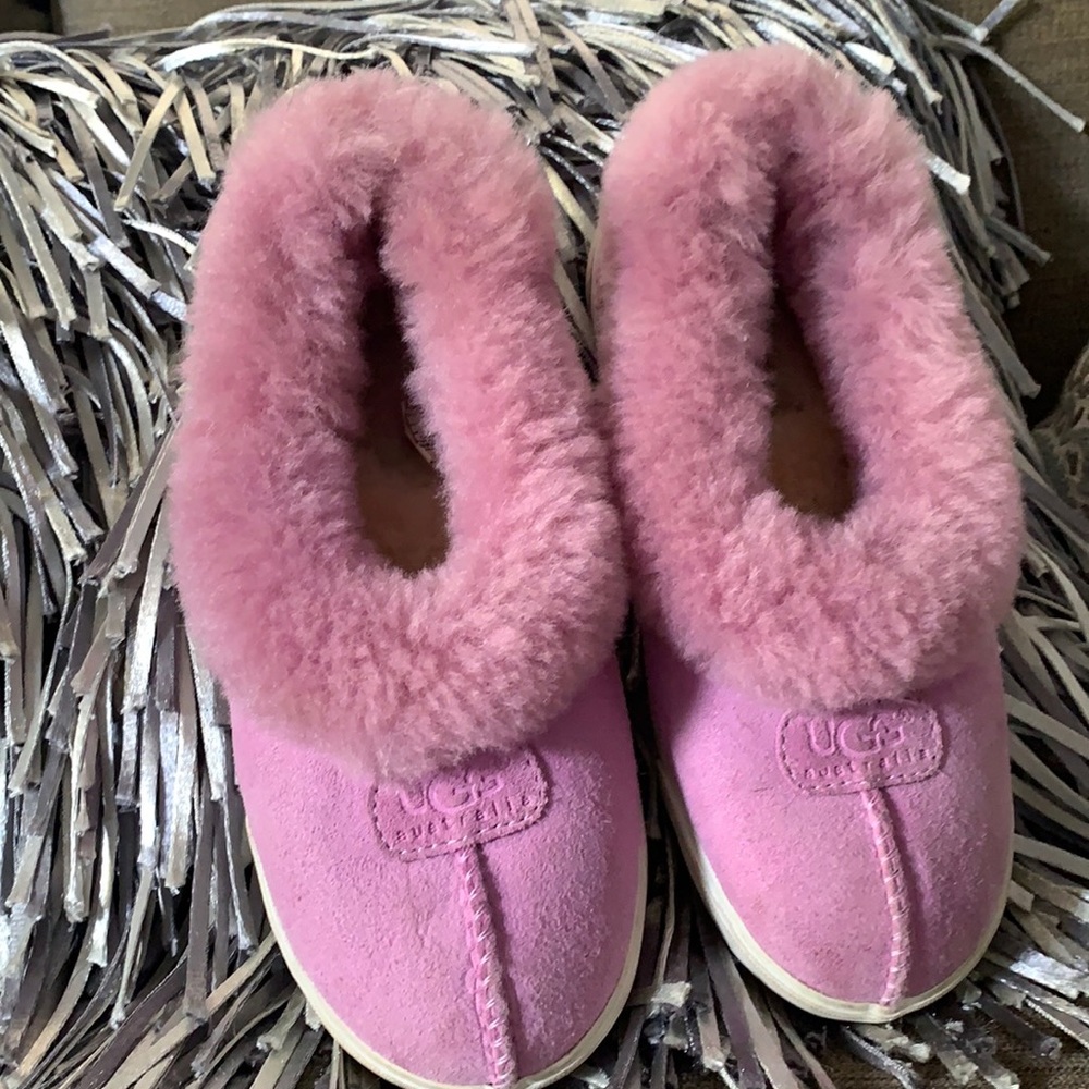 Ugg pink kids slippers. Still in good shape
